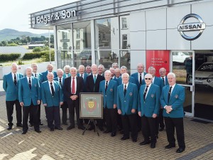 Whitehaven Male Voice Choir receive a three year sponsorship from J Edgar & Son at Rowrah. pic MIKE McKENZIE 12th Aug 2015 EDGAR'S IN HARMONY WITH CHOIR: Terry Edgar, third left on the front row with members of the Whitehaven Male Voice Choir after announcing a three year sponsorship from the J Edgar & Son franchice at Rowrah. pic Mike McKenzie50079451W000.JPG